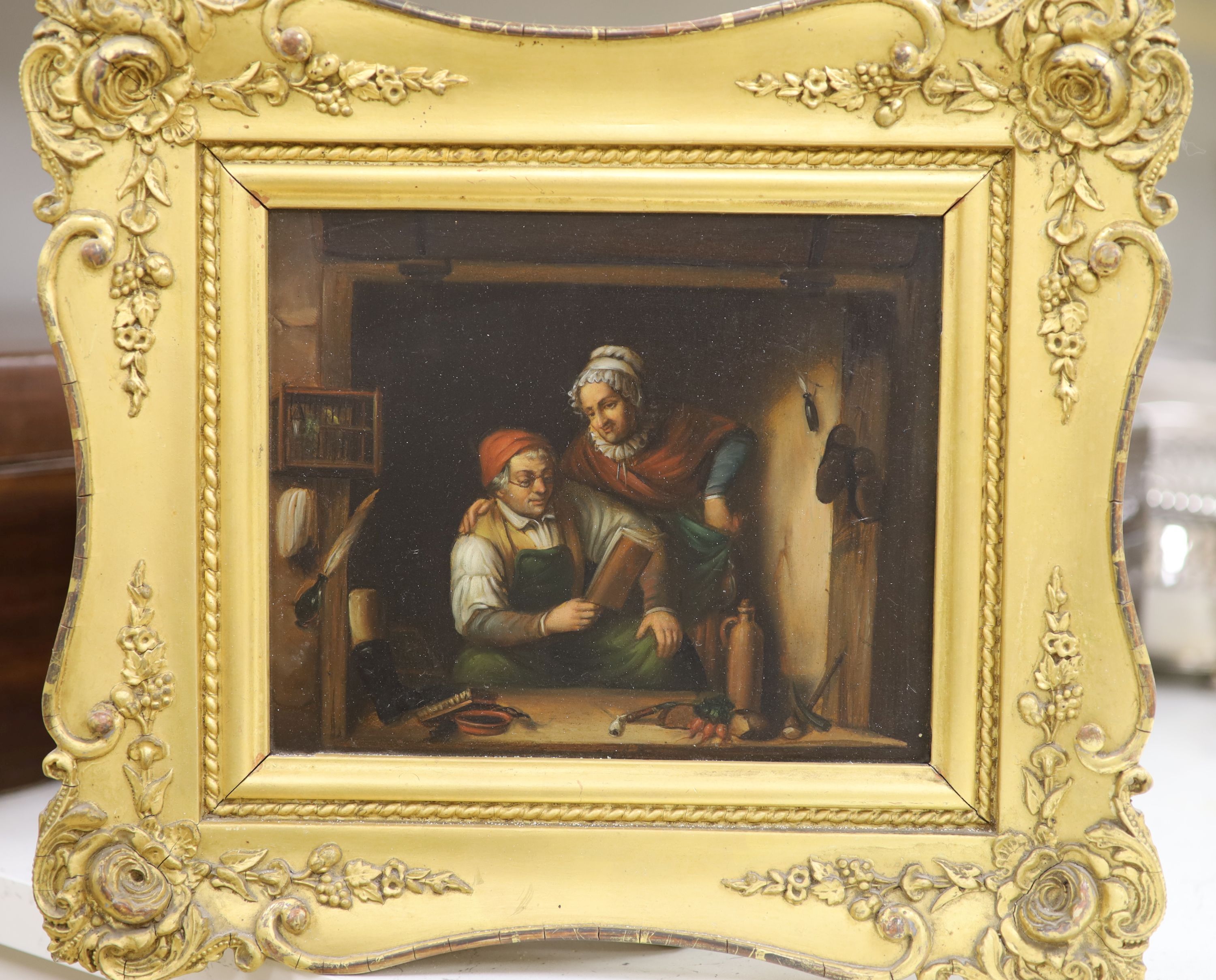 19th Century German School, oil on zinc, Interior with couple in a scullery, 15 x 19cm.